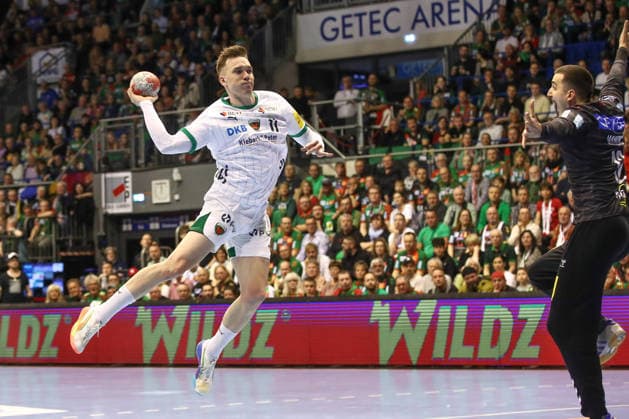 28.03.2026, xtgx, Handball, Daikin HBL, SC Magdeburg - Füchse Berlin v.l. Lasse Andersson (Berlin, 11) wirft Tor, Torschuetze, erzielt Tor, Treffer, scores the goal Magdeburg
