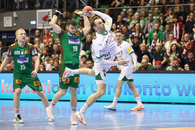 28.03.2026, xtgx, Handball, Daikin HBL, SC Magdeburg - Füchse Berlin v.l. Mathias Gidsel (Berlin, 19) wirft Tor, Torschuetze, erzielt Tor, Treffer, scores the goal Magdeburg