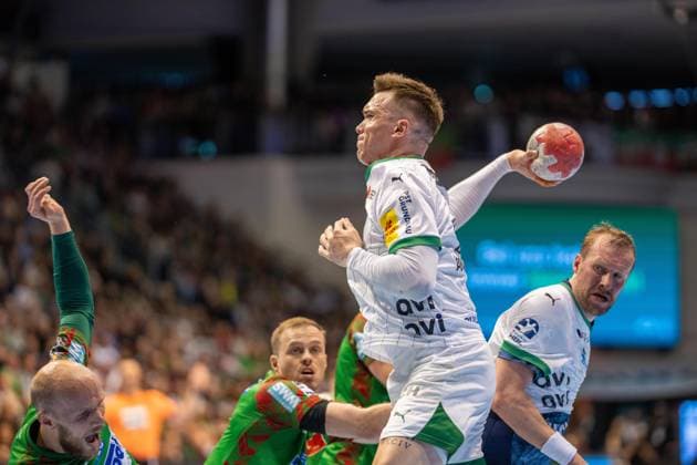 Deutschland: HBL DAIKIN Handball Bundesliga 2025 - 2026, 26. Spieltag - SC Magdeburg vs Füchse Berlin - GETEC Arena (Magdeburg): Lasse Andersson (Füchse Berlin, 11) am Ball Copyright: xTomxLauruschkatx
