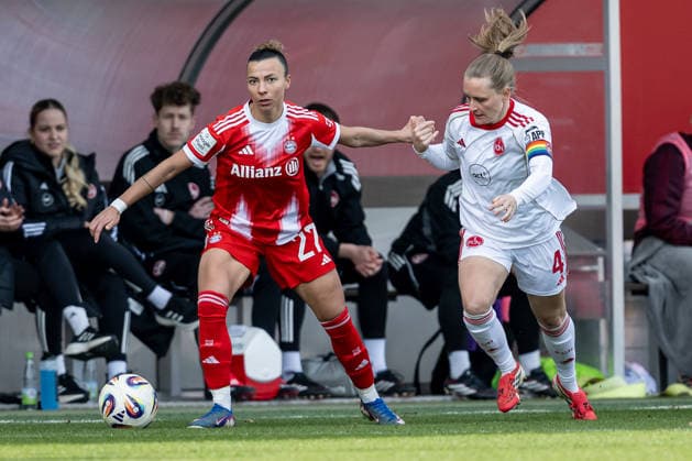 Kampf um den Ball Zweikampf zwischen Arianna Caruso (FC Bayern Muenchen Frauen, 27) und Luisa Guttenberger (1. FC Nuernberg, 04) GER, FC Bayern Muenchen Frauen vs. 1. FC Nuernberg, Fussball, Google Pixel Frauen-Bundesliga, 22. Spieltag, Saison 2025 2026, 28.03.2026. (DFL DFB REGULATIONS PROHIBIT ANY USE OF PHOTOGRAPHS as IMAGE SEQUENCES and or QUASI-VIDEO). GER, FC Bayern Muenchen Frauen vs. 1. FC Nuernberg, Fussball, Google Pixel Frauen-Bundesliga, 22. Spieltag, Saison 2025 2026, 28.03.2026. Muenchen Copyright: xEibner-Pressefoto HeikexFeinerx EP_HFR