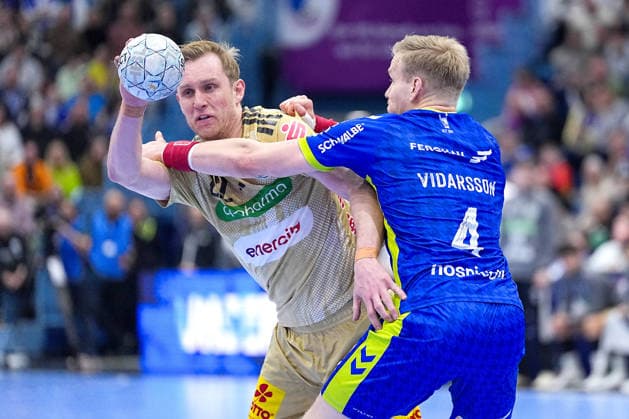 28.03.2026, xydrx, Handball, 1.HBL, VfL Gummersbach - TSV Hannover-Burgdorf, Schwalbe-Arena: Marian Michalczik (TSV Hannover-Burgdorf 22) im Zweikampf gegen Ellidi Vidarsson (VfL Gummersbach 4) Photo: xYannisxDreimannxPressefotoKochx Nordrhein-Westfahlen Deutschland
