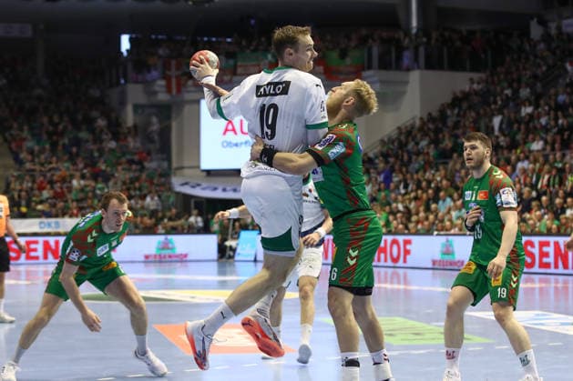 28.03.2026, xtgx, Handball, Daikin HBL, SC Magdeburg - Füchse Berlin v.l. Mathias Gidsel (Berlin, 19), Matthias Musche (Magdeburg, 6) Zweikampf, Duell, Kampf, tackle Magdeburg
