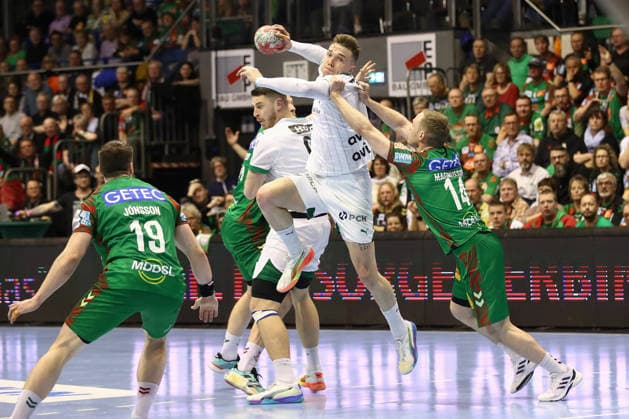 28.03.2026, xtgx, Handball, Daikin HBL, SC Magdeburg - Füchse Berlin v.l. Lasse Andersson (Berlin, 11) Omar Ingi Magnusson (Magdeburg, 14) Zweikampf, Duell, Kampf, tackle Magdeburg