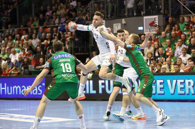 28.03.2026, xtgx, Handball, Daikin HBL, SC Magdeburg - Füchse Berlin v.l. Lasse Andersson (Berlin, 11) Omar Ingi Magnusson (Magdeburg, 14) Zweikampf, Duell, Kampf, tackle Magdeburg
