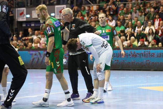 28.03.2026, xtgx, Handball, Daikin HBL, SC Magdeburg - Füchse Berlin v.l. Nils Lichtlein (Berlin, 17) verletzt Verletzung Magdeburg