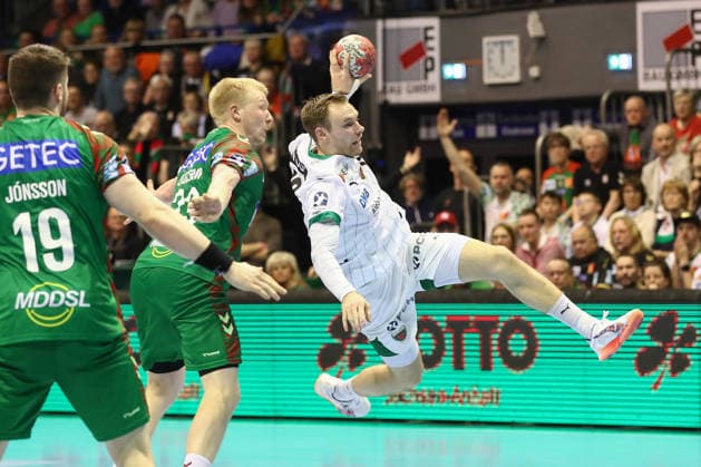 28.03.2026, xtgx, Handball, Daikin HBL, SC Magdeburg - Füchse Berlin v.l. Mathias Gidsel (Berlin, 19) wirft Tor, Torschuetze, erzielt Tor, Treffer, scores the goal Magdeburg
