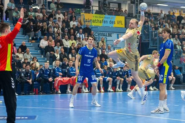 Dominik Kuzmanović, Torwart, (VfL Gummersbach 1), Justus Fischer, Kreislaeufer, (TSV Hannover-Burgdorf 54),Miro Schluroff, Rueckraum, (VfL Gummersbach 15), VfL Gummersbach vs. TSV Hannover-Burgdorf, Daikin Handball Bundesliga, Herren , 26. Spieltag, 28.03.2026 Gummersbach NRW Deutschland