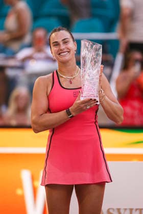 Miami Open Presented by Itau 2026 - March 27 Miami, Florida - March 27: Aryna Sabalenka celebrates with trophy after winning the Women™s Singles Final during the Women™s Singles Final match between Aryna Sabalenka and Coco Gauff of USA on day 12 of the Miami Open at Hard Rock Stadium on March 27, 2026 in Miami, Florida, United States. Copyright: xLatinxSportxImagesx