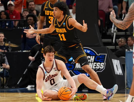 March 28, 2026, Houston, Texas, USA: Iowa guard KAEL COMBS (11) reacts after being called for a foul against Illinois forward DAVID MIRKOVIC (0) during the NCAA, College League, USA MenÃ¢â‚¬â ¢s Basketball Tournament Elite Eight game between the Illinois Fighting Illini and the Iowa Hawkeyes on March 28, 2026 in Houston, Texas. Illinois won, 71-59. NCAA Basketball 2026: Illinois 71:59 Iowa  - ZUMAc201 20260328_zap_c201_022 Copyright: xScottxColemanx
