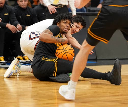 March 28, 2026, Houston, Texas, USA: Iowa guard TAVION BANKS (6) works against Illinois guard ANDREJ STOJAKOVIC (2) for a loose ball during the NCAA, College League, USA MenÃ¢â‚¬â ¢s Basketball Tournament Elite Eight game between the Illinois Fighting Illini and the Iowa Hawkeyes on March 28, 2026 in Houston, Texas. Illinois won, 71-59. Houston USA - ZUMAc201 20260328_zap_c201_071 Copyright: xScottxColemanx