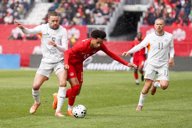 Canada v Iceland - International Friendly, Länderspiel, Nationalmannschaft Match Tajon Buchanan 17 of Canada and Sverrir Ingi Ingason 5 of Iceland battle for the ball during the International Friendly match between Canada and Iceland at BMO Filed. on March 28, 2026 in Toronto, Ontario. (Photo by Leonardo Ramirez Eyepix Group) Copyright: xLeonardoxRamirezx xEyepixxGroupx LR28032025-00078