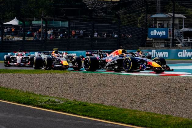 SUZUKA - Formula 1 driver Max Verstappen of Oracle Red Bull Racing and Formula 1 driver Isack Hadjar of Oracle Red Bull Racing in a battle during the Formula 1 Japan Suzuka race at the Suzuka Formula 1 circuit on March 29, 2025 in Suzuka, Japan. (Photo by DeFodi Images) -
