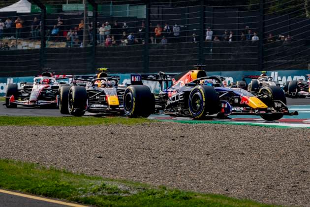 SUZUKA - Formula 1 driver Max Verstappen of Oracle Red Bull Racing and Formula 1 driver Isack Hadjar of Oracle Red Bull Racing in a battle during the Formula 1 Japan Suzuka race at the Suzuka Formula 1 circuit on March 29, 2025 in Suzuka, Japan. (Photo by DeFodi Images) -