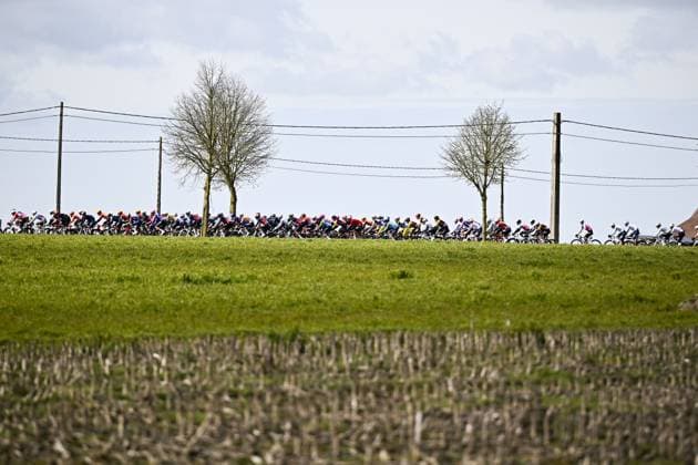 The pack of riders of the second peloton pictured in action during the men elite Middelkerke-Wevelgem - In Flanders Fields one day cycling race, 240.8 km from Middelkerke to Wevelgem, on Sunday 29 March 2026. JASPERxJACOBS  x169242873x
