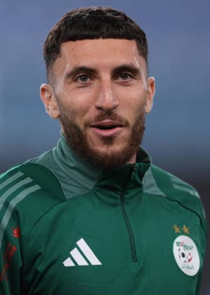 Genoa, Italy, 27th March 2026. Fares Ghedjemis of Algeria reacts as he makes his way to the bench prior to kick off in the Algeria vs Guatemala International Friendly, Länderspiel, Nationalmannschaft match at Luigi Ferraris, Genoa. Picture credit should read: Jonathan Moscrop Sportimage EDITORIAL USE ONLY. No use with unauthorised audio, video, data, fixture lists, club league logos or live services. Online in-match use limited to 120 images, no video emulation. No use in betting, games or single club league player publications. SPI_022_JM_ALGERIA_GUATEMALA SPI-4624-0022