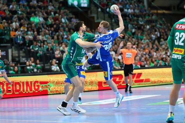 Leipzig, 29.03.2026, QUARTERBACK ARENA, Spieltag 26, Handball Bundesliga , SC DHFK Leipzig vs. ThSV Eisenach , Im Bild v.l.: Marko Mamic (14, Leipzig) und Dominik Solak (30, Eisenach) ,