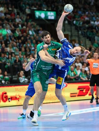 Leipzig, 29.03.2026, QUARTERBACK ARENA, Spieltag 26, Handball Bundesliga , SC DHFK Leipzig vs. ThSV Eisenach , Im Bild v.l.: Marko Mamic (14, Leipzig) und Dominik Solak (30, Eisenach) ,