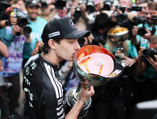 March 29, 2026, Suzuka, Mie, Japan: KIMI ANTONELLI of Mercedes kisses the winnerÃ¢â‚¬â ¢s trophy after the Formula 1 Japanese Grand Prix at Suzuka Circuit. Suzuka Japan - ZUMAh201 20260329_zsp_h201_053 Copyright: xYichinxHoux