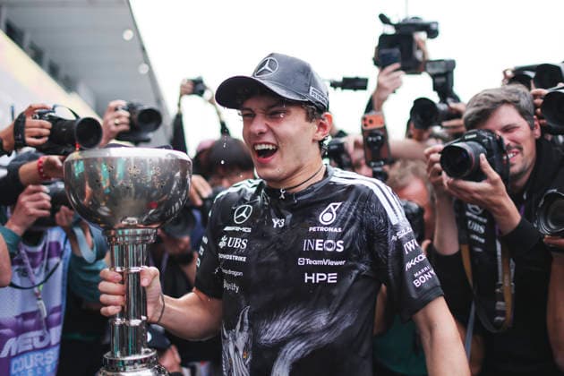 March 29, 2026, Suzuka, Mie, Japan: KIMI ANTONELLI of Mercedes reacts while being sprayed with champagne as he holds the winnerÃ¢â‚¬â ¢s trophy after the Formula 1 Japanese Grand Prix at Suzuka Circuit. Suzuka Japan - ZUMAh201 20260329_zsp_h201_056 Copyright: xYichinxHoux