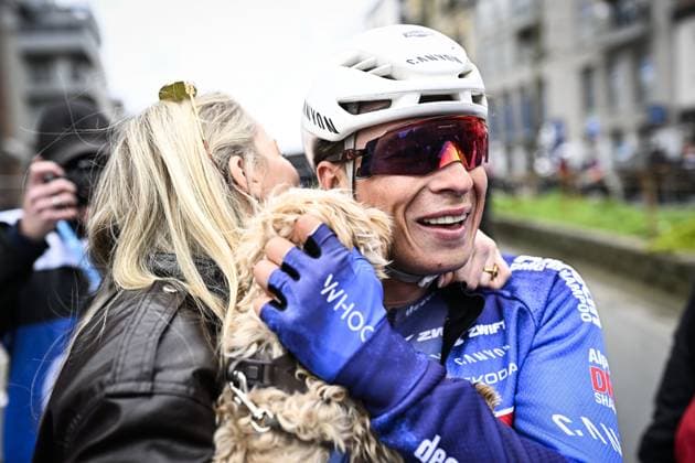 Belgian Jasper Philipsen and his partner Melanie Peetermans celebrate after winning the men elite Middelkerke-Wevelgem - In Flanders Fields one day cycling race, 240.8 km from Middelkerke to Wevelgem, on Sunday 29 March 2026. JASPERxJACOBS  x169253432x