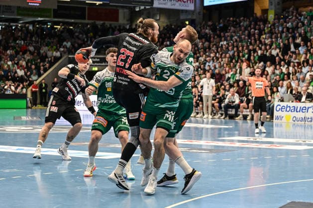 DAIKIN HBL Bundesliga: Frisch Auf! Göppingen - HC Erlangen; Göppingen, 29.03.2026 Antonio Metzner (HC Erlangen, 27) scheitert an der Verteidigung hier Marcel Schiller (FRISCH AUF! Göppingen, 24) Göppingen, 29.03.2026, 26. Spieltag der DAIKIN Handball-Bundesliga, Frisch Auf! Göppingen - HC Erlangen EWS-Arena, Göppingen. Göppingen, 29.03.2026, 26. Spieltag der DAIKIN Handball-Bundesliga, Frisch Auf! Göppingen - HC Erlangen EWS-Arena, Göppingen. Copyright: xBEAUTIFULxSPORTS Märklx