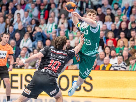Elias Newel (Frisch Auf Goeppingen, 40) im Zweikampf mit Florian Scheerer (HC Erlangen, 10), Frisch Auf Goeppingen vs. HC Erlangen, Handball, 1. Bundesliga, Herren, Spielzeit 2025 2026, 29.03.2026, Frisch Auf Goeppingen vs. HC Erlangen, Handball, 1. Bundesliga, Herren, Spielzeit 2025 2026, 29.03.2026 Goeppingen Copyright: xEibner-Pressefoto MichaelxSchmidx EP_MST