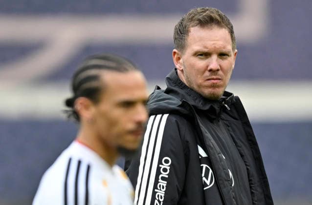 Leroy Sane GER (19) dahinter Bundestrainer Trainer Coach Julian Nagelsmann GER Aufwaermen Training iam 29.03.2026 m Vorfeld des DFB Laenderspiel Deutschland GER vs Ghana GHA Freundschatsspiel Testspiel am 30.03.2026 DFL REGULATIONS PROHIBIT ANY USE OF PHOTOGRAPHS AS IMAGE SEQUENCES AND OR QUASI-VIDEO DFB Laenderspiel Deutschland GER vs Ghana GHA *** Leroy Sane GER 19 behind national coach Coach Julian Nagelsmann GER warm-up training iam 29 03 2026 m ahead of DFB Laenderspiel Germany GER vs Ghana GHA Freundschatsspiel Testspiel am 30 03 2026 DFL REGULATIONS PROHIBIT ANY USE OF PHOTOGRAPHS AS IMAGE SEQUENCES AND OR QUASI VIDEO DFB Laenderspiel Germany GER vs Ghana GHA