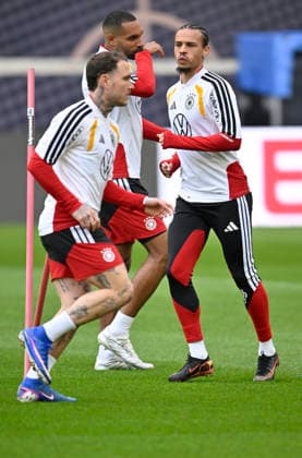 David Raum GER (22) Leroy Sane GER (19) Jonathan Tah GER (04) Aufwaermen Training iam 29.03.2026 m Vorfeld des DFB Laenderspiel Deutschland GER vs Ghana GHA Freundschatsspiel Testspiel am 30.03.2026 DFL REGULATIONS PROHIBIT ANY USE OF PHOTOGRAPHS AS IMAGE SEQUENCES AND OR QUASI-VIDEO DFB Laenderspiel Deutschland GER vs Ghana GHA