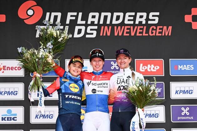 Belgian Fleur Moors of Lidl-Trek, Dutch Lorena Wiebes of SD Worx-Protime and Dutch Karlijn Swinkels of UAE Team ADQ pictured on the podium after the women elite Wevelgem to Wevelgem - In Flanders Fields one day cycling race, 134.9 km from and to Wevelgem, on Sunday 29 March 2026. MAARTENxSTRAETEMANS  x169261015x
