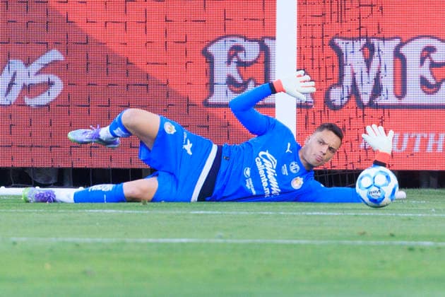 March 29, 2026, Los Angeles, California, USA: Goalkeeper, Oscar Whalley 13 of the Chivas de Guadalajara blocks a shot to the goal during the Clasico Tapatio game against the Atlas FC on Sunday March 29, 2026 at the BMO Stadium in Los Angeles, California. Chivas defeats Atlas FC, 1-0. ARIANA RUIZ PI Los Angeles USA - ZUMAp124 20260329_zaa_p124_001 Copyright: xArianaxRuizx