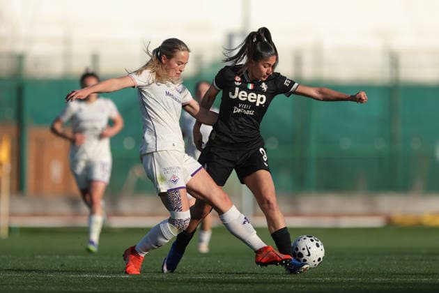 Biella, Italy, 29th March 2026. Oda Johansen of AFC Fiorentina tussles with Chiara Beccari of Juventus during the Juventus Women vs Fiorentina Women Coppa Italia Femminile Semi Final 2nd leg match at Stadio Vittorio Pozzo, Biella. Picture credit should read: Jonathan Moscrop Sportimage EDITORIAL USE ONLY. No use with unauthorised audio, video, data, fixture lists, club league logos or live services. Online in-match use limited to 120 images, no video emulation. No use in betting, games or single club league player publications. SPI_017_JM_JUVE_FIORENTINA_FEMM_CI SPI-4623-0017