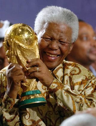 Nelson Mandela with The World Cup trophy in 2004 when FIFA President Sepp Blatter awarded the event to South Africa in Switzerland 15 05 04 NELSON MANDELA GRASPS THE WORLD CUP AS SOUTH AFRICA ARE AWARED THE 2010 WORLD CUP PHOTO Andy Muller INTERNATIONAL SPORTS FOTOS Zurich Switzerland Copyright: xAndyxMuellerx