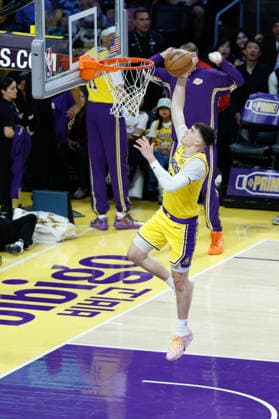 LOS ANGELES, CA - MARCH 30: Los Angeles Lakers forward Jake LaRavia (12) goes up for a dunk during the Washington Wizards vs Los Angeles Lakers game on March 30, 2026, at Crypto.com Arena in Los Angeles, CA. (Photo by Jevone Moore Icon Sportswire) NBA, Basketball Herren, USA MAR 30 Washington Wizards at Los Angeles Lakers EDITORIAL USE ONLY Icon20260330020