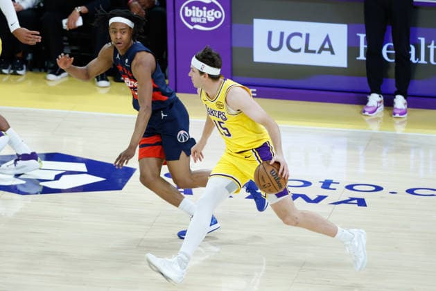 LOS ANGELES, CA - MARCH 30: Los Angeles Lakers guard Austin Reaves (15) dribbles the ball during the Washington Wizards vs Los Angeles Lakers game on March 30, 2026, at Crypto.com Arena in Los Angeles, CA. (Photo by Jevone Moore Icon Sportswire) NBA, Basketball Herren, USA MAR 30 Washington Wizards at Los Angeles Lakers EDITORIAL USE ONLY Icon20260330025