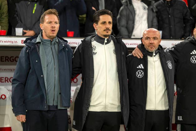 30.03.2026, Fussball Freundschafts-Länderspiele 2.Spieltag, Deutschland - Ghana, in der MHP-Arena Stuttgart (Deutschland). Bei der Hymne, v.li: Trainer Julian Nagelsmann (Deutschland), Co-Trainer Benjamin Hübner (Deutschland), Co-Trainer Alfred Schreuder (Deutschland), *** 30 03 2026, Football friendly international 2 match day, Germany Ghana, at the MHP Arena Stuttgart Germany During the anthem, from left coach Julian Nagelsmann Germany , co-coach Benjamin Hübner Germany , co-coach Alfred Schreuder Germany ,