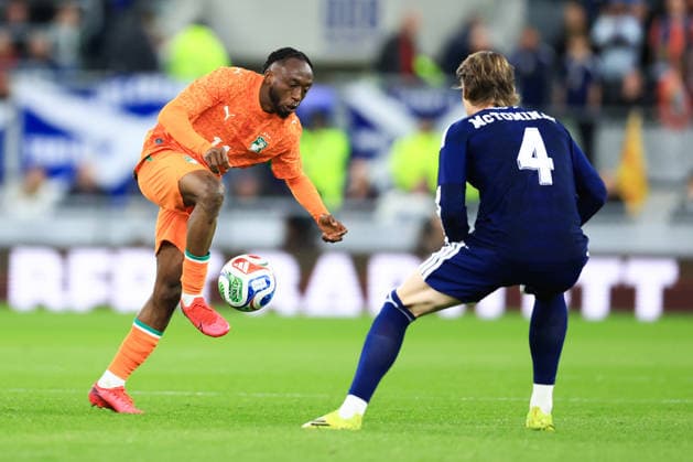 Liverpool, England, 31st March 2026. Benie TraorÃ of CÃ te d Ivoire is challenged by Scott McTominay of Scotland during the CÃ te d Ivoire vs Scotland International Friendly, Länderspiel, Nationalmannschaft match at Hill Dickinson Stadium, Liverpool. Picture credit should read: Jessica Hornby Sportimage EDITORIAL USE ONLY. No use with unauthorised audio, video, data, fixture lists, club league logos or live services. Online in-match use limited to 120 images, no video emulation. No use in betting, games or single club league player publications. SPI_028_JH_C__TE_DIVOIRE_SCOTLAND SPI-4656-0028