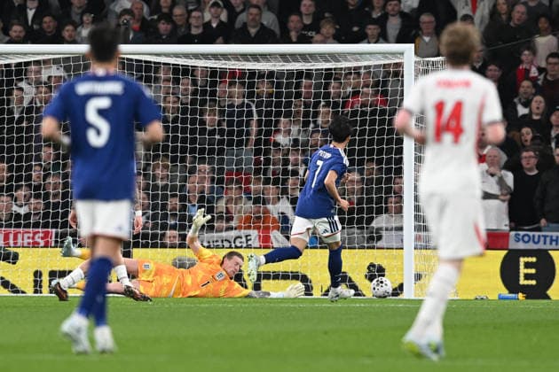 England v Japan, Friendly Goal 0-1 - Kaoru Mitoma of Japan scores the opening goal beating Jordan Pickford of England during the Friendly match between England and Japan at Wembley Stadium, London, UK on 31 March 2026. London Wembley Stadium Greater London UK Editorial use only , Copyright: xGrahamxHuntx PSI-23978-0064