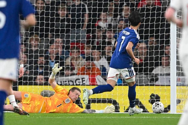England v Japan, Friendly Goal 0-1 - Kaoru Mitoma of Japan scores the opening goal beating Jordan Pickford of England during the Friendly match between England and Japan at Wembley Stadium, London, UK on 31 March 2026. London Wembley Stadium Greater London UK Editorial use only , Copyright: xGrahamxHuntx PSI-23978-0065