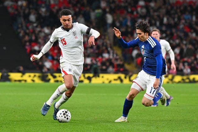 England v Japan, Friendly Morgan Rogers of England on the attack battles for possession with Ao Tanaka of Japan during the Friendly match between England and Japan at Wembley Stadium, London, UK on 31 March 2026. London Wembley Stadium Greater London UK Editorial use only , Copyright: xGrahamxHuntx PSI-23978-0118