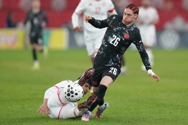 March 31, 2026, Toronto, On, CAN: Canada s Marcelo Flores takes the ball past Tunisia s Alaa Ghram during second half International Friendly, Länderspiel, Nationalmannschaft action in Toronto, on Tuesday March 31, 2026. Marcelo Flores ; Alaa Ghram  - ZUMAc35_ 20260331_zaf_c35_132 Copyright: xChrisxYoungx