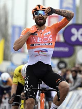 Italian Filippo Ganna of INEOS Grenadiers celebrates after winning the men elite race of the Dwars Door Vlaanderen cycling event, 184,6km from Roeselare to Waregem, Wednesday 01 April 2026. TOM GOYVAERTS TomxGoyvaerts  x169508372x
