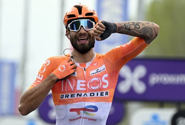 Italian Filippo Ganna of INEOS Grenadiers celebrates after winning the men elite race of the Dwars Door Vlaanderen cycling event, 184,6km from Roeselare to Waregem, Wednesday 01 April 2026. TOM GOYVAERTS TomxGoyvaerts  x169508755x