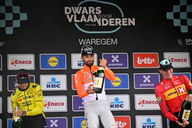 Dwars door Vlaanderen 2026 Cycling Race WAREGEM, BELGIUM - APRIL 01 : Van Aert Wout (BEL) of Team Visma Lease a Bike, Ganna Filippo (ITA) of INEOS Grenadiers and Waerenskjold Soren (NOR) of Uno-X Mobility pictured during the podium ceremony of the 80th edition of Dwars door Vlaanderen an UCI World Tour 1.UWT one day cycling road race for Men Elite of 184 km with start in Roeselare and finish in Waregem on April 1, 2026 in Waregem, Belgium, 01 04 2026 ( Motordriver Kenny Verfaillie - Waregem Belgium  Copyright: xTomasxSiskx