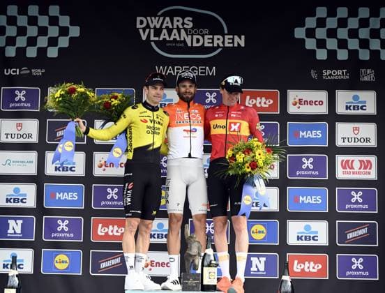 Belgian Wout van Aert of Team Visma-Lease a Bike, Italian Filippo Ganna of INEOS Grenadiers and Norwegian Soren Waerenskjold pictured on the podium after the men elite race of the Dwars Door Vlaanderen cycling event, 184,6km from Roeselare to Waregem, Wednesday 01 April 2026. TOM GOYVAERTS TomxGoyvaerts  x169512063x