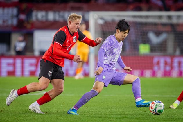 AUSTRIA - SOUTH KOREA Xaver Schlager of Austria and RB Leipzig and Lee Kang In of South Korea and Paris Saint Germain during the friendly football match ahead of FIFA World Cup, WM, Weltmeisterschaft, Fussball 2026 WM, Weltmeisterschaft, Fussball WM, Weltmeisterschaft, Fussball between Austria and South Korea Republic, matchday 12. Ernst Happel Stadium, Stadion, Vienna, Austria, March 31, 2026. Photo by Branislav Racko Copyright: xx aut_kor0187