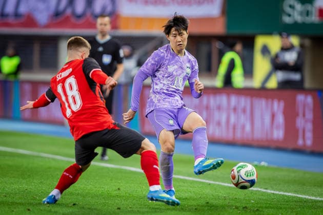 AUSTRIA - SOUTH KOREA Romano Schmid of Austria and Werder Bremen and Lee Kang In of South Korea and Paris Saint Germain during the friendly football match ahead of FIFA World Cup, WM, Weltmeisterschaft, Fussball 2026 WM, Weltmeisterschaft, Fussball WM, Weltmeisterschaft, Fussball between Austria and South Korea Republic, matchday 12. Ernst Happel Stadium, Stadion, Vienna, Austria, March 31, 2026. Photo by Branislav Racko Copyright: xx aut_kor0363