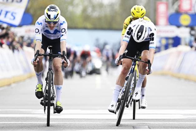 Swiss Marlen Reusser of Movistar Team celebrates after winning ahead of Dutch Lieke Nooijen of Team Visma-Lease a Bike and Dutch Demi Vollering of FDJ United-SUEZ in the women elite race of the Dwars Door Vlaanderen cycling event, 128,9km from Roeselare to Waregem, Wednesday 01 April 2026. TOM GOYVAERTS TomxGoyvaerts  x169522291x