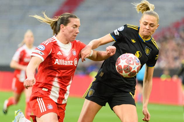 MUNICH, GERMANY - APRIL 1: Vanessa Gilles (2 FC Bayern Munich) and Fridolina Rolfo (12 Manchester United, ManU during the UEFA Womens Champions League quarter-final match between FC Bayern Munich and Manchester United at Allianz Arena in Munich, Germany.  Copyright: xSvenxBeyrich SPPx Sportspressphoto_SPR122704