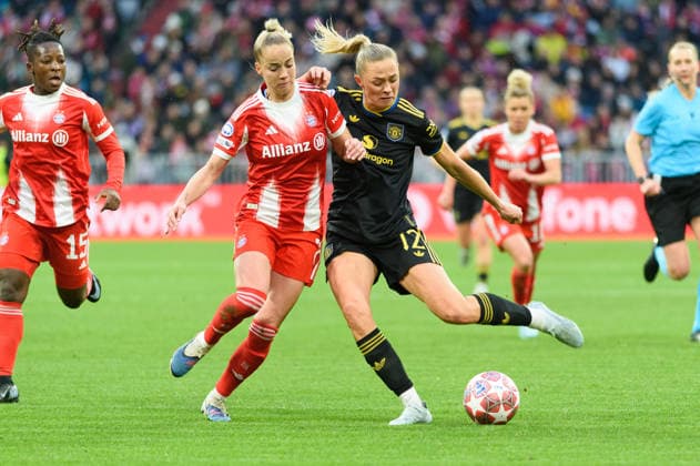 MUNICH, GERMANY - APRIL 1: Giulia Gwinn (7 FC Bayern Munich) and Fridolina Rolfo (12 Manchester United, ManU during the UEFA Womens Champions League quarter-final match between FC Bayern Munich and Manchester United at Allianz Arena in Munich, Germany.  Copyright: xSvenxBeyrich SPPx Sportspressphoto_SPR122705
