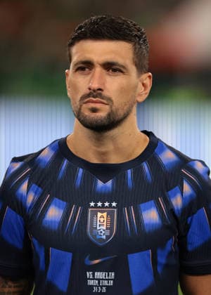Turin, Italy, 31st March 2026. Giorgian de Arrascaeta of Uruguay looks on during the line up prior to the Algeria vs Uruguay International Friendly, Länderspiel, Nationalmannschaft match at Allianz Stadium, Turin. Picture credit should read: Jonathan Moscrop Sportimage EDITORIAL USE ONLY. No use with unauthorised audio, video, data, fixture lists, club league logos or live services. Online in-match use limited to 120 images, no video emulation. No use in betting, games or single club league player publications. SPI_129_JM_ALGERIA_URUGUAY SPI-4625-0129